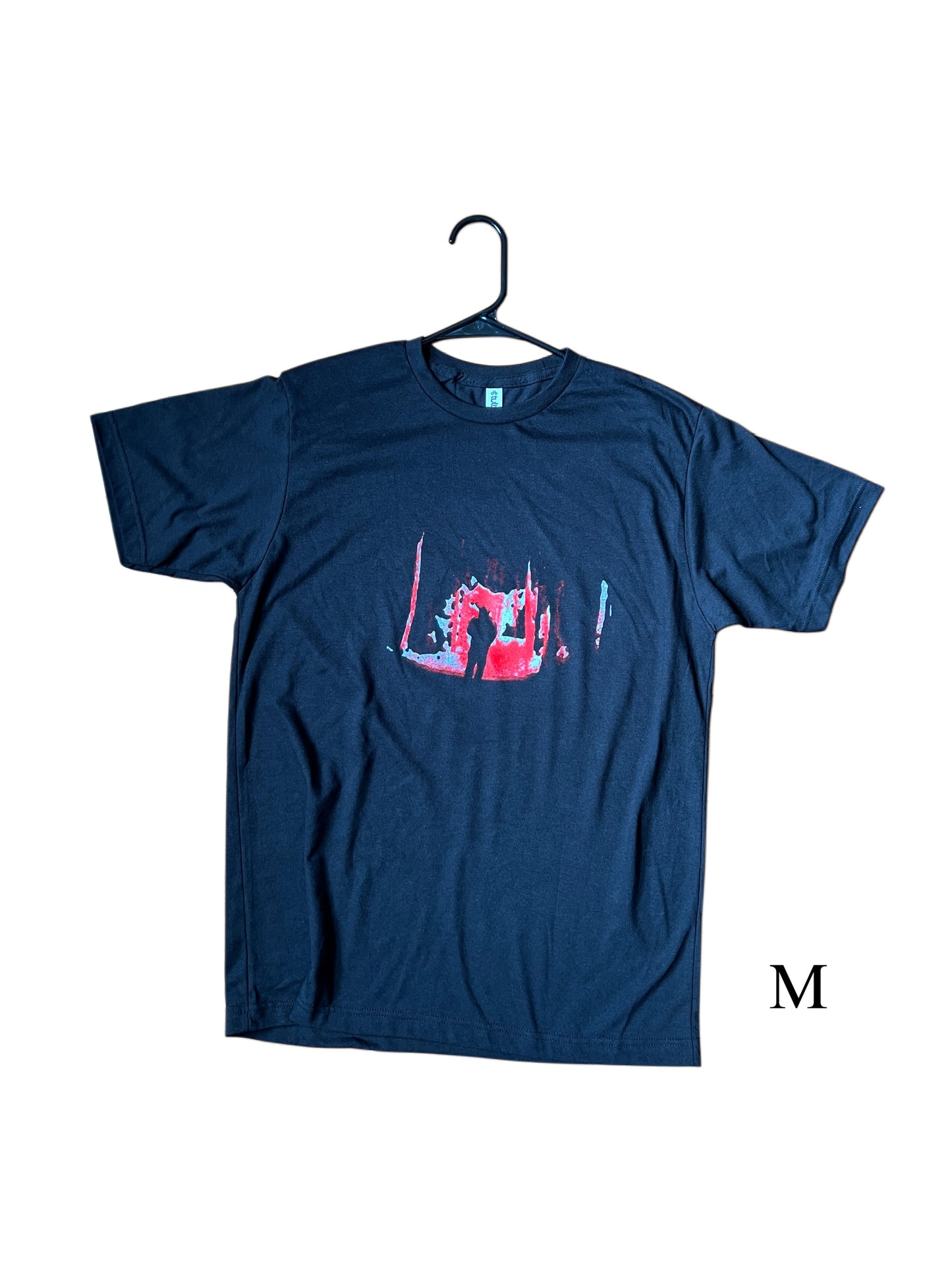 Guy in a woods tee