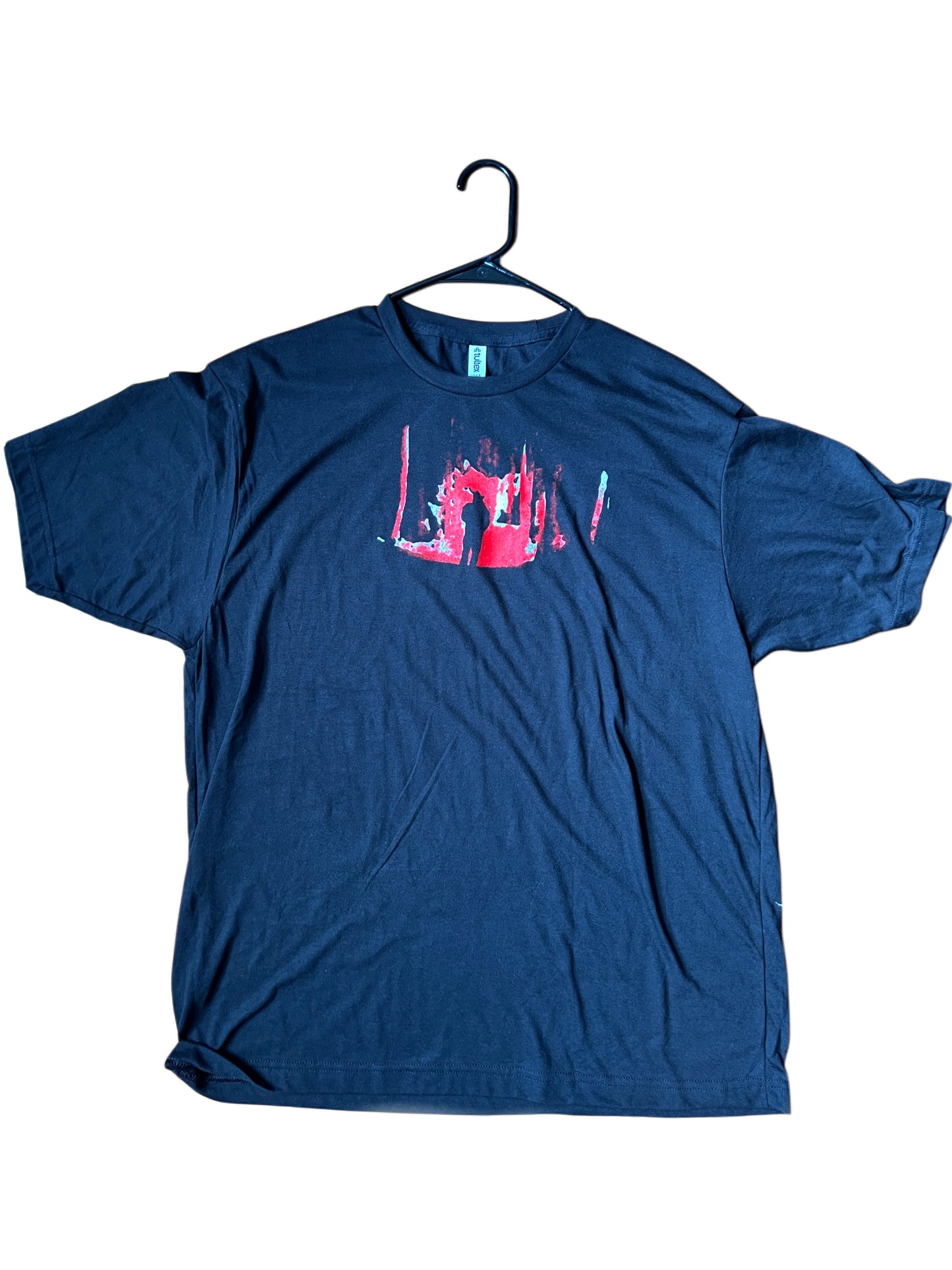 Guy in a woods tee